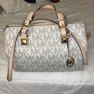 Michael Kors LARGE bag. Very spacious!!